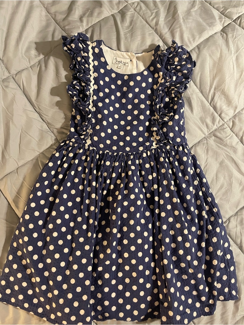 Pippa & Julie Navy and White Polka Dot Ruffle Dress